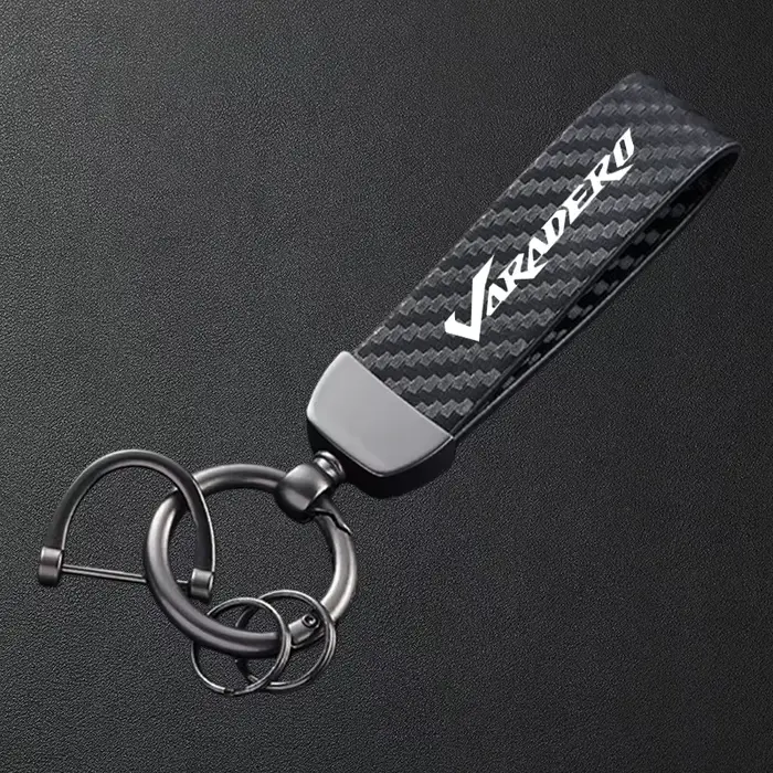 Porte-clés de moto en cuir texturé en fibre de carbone